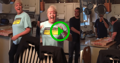 Couple surprise family with pizza box pregnancy reveal (Video)
