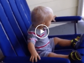 Toddler in rocking chair watches neighbors in drive-by fight (Video)