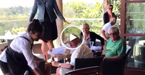 Waitress drags unwanted guest out of restaurant (Video)