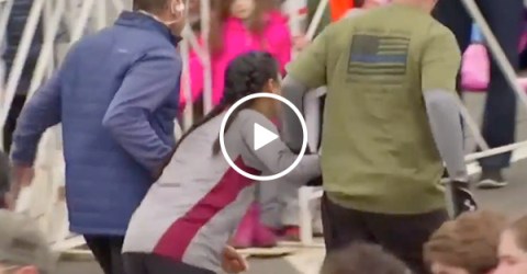 Two guys jump in to help distressed girl at half marathon