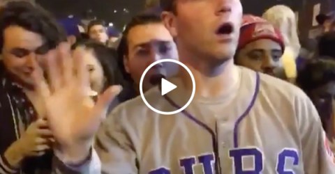 Cubs fan stops a fight the only way he knows how (Video)