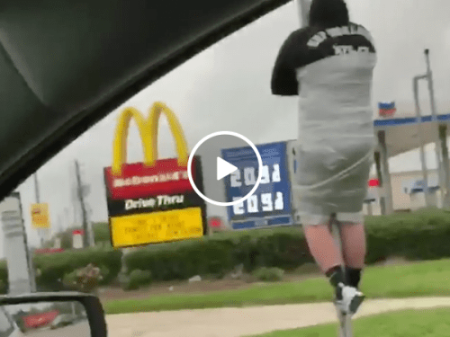 Guy loses bet and gets duck taped to pole (Video)