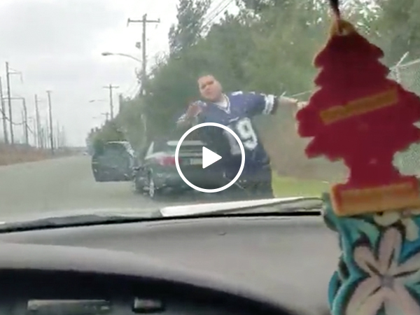 Eagles fans try to run over a Cowboys fan in broad daylight (Video)