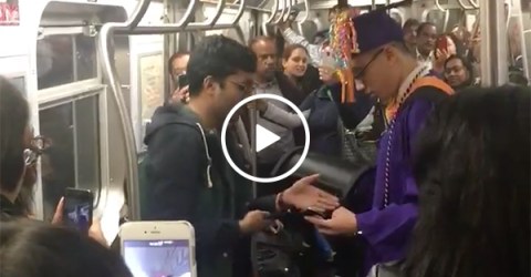 Kid has makeshift graduation on subway