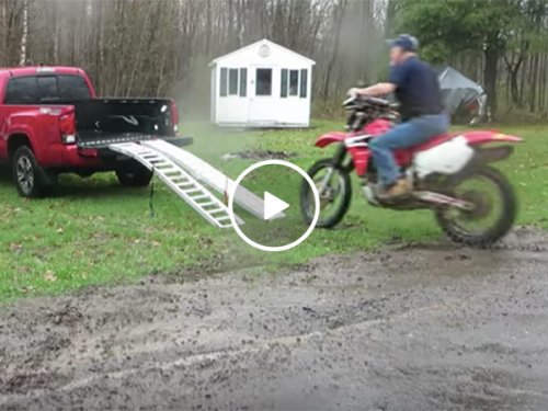 Guy fails at loading motorcycle into his truck