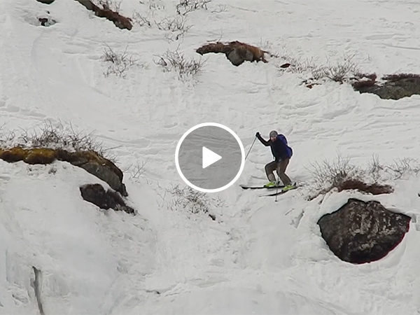 Skier falls head over heels down the mountain