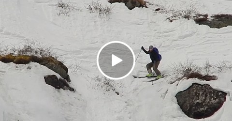Skier falls head over heels down the mountain
