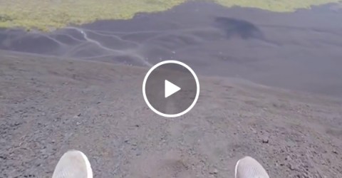 Sledding down a volcanic ash hill at 40 MPH seems... safe? (Video)