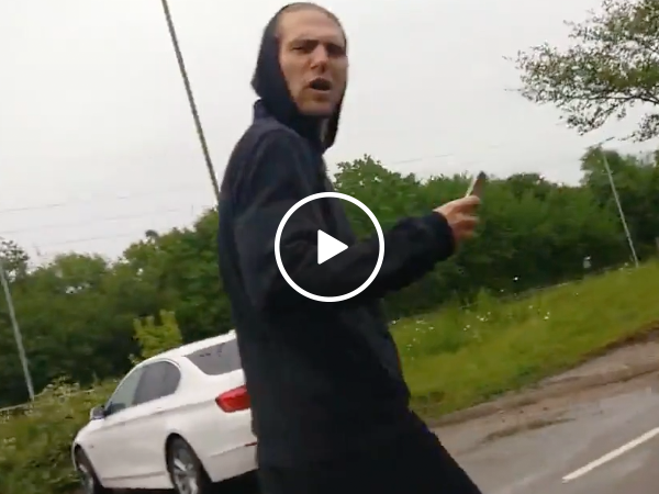 Asshole throws bottle at car and receives instant karma