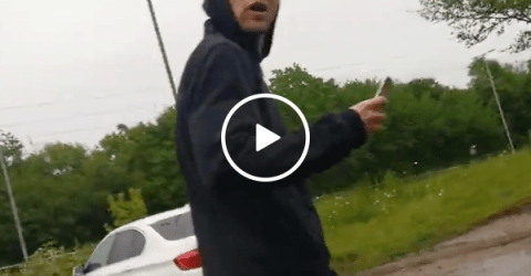 Asshole throws bottle at car and receives instant karma