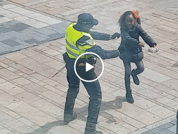 Police have dance off with little girls (Video)
