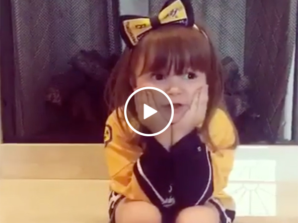 Young girl gives team inspirational speech