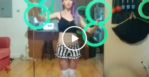 Cute girl does awesome trick with rings (Video)
