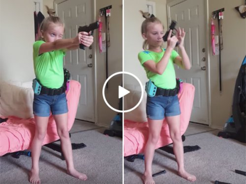 Little girl puts on a gun demonstration