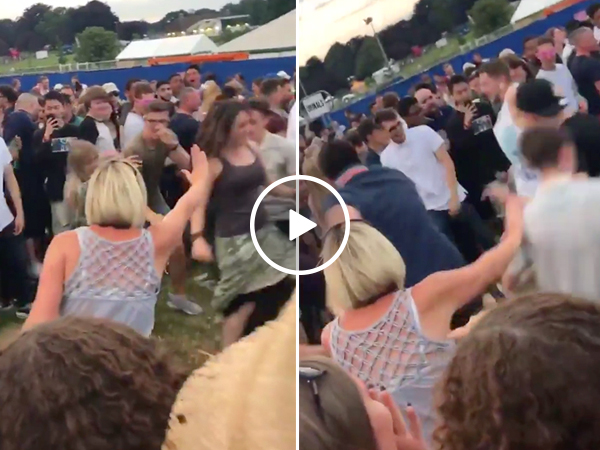 Let's all admire this mom's hilariously futile attempt at stopping a mosh pit (Video)