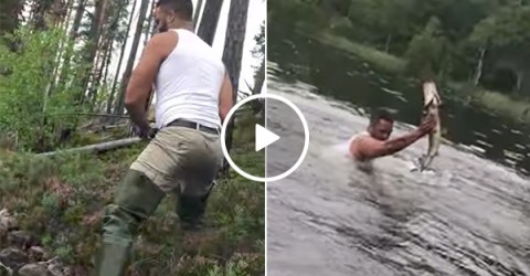 Guy catches fish with his bare hands