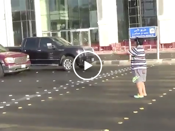 Kid dances in middle of street