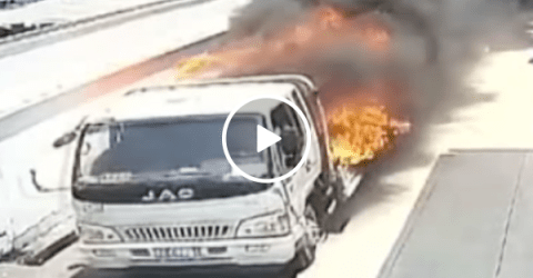 Brave Chinese worker risks life to drive flaming truck away from building (Video)
