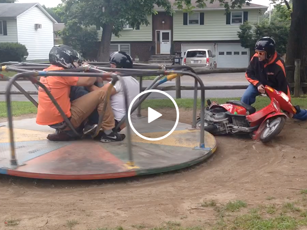 three idiots spin on merry go round using scooter fail video thechive