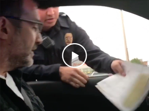 Police officer pulls over new grandpa for baby announcement (Video)