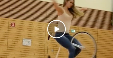 Hot Girl Does Acrobatic Tricks On a Bicycle