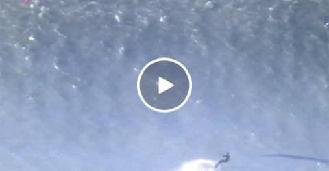 Surfer Climbs Up Huge Wave in Tahiti and Makes An Insane Jump