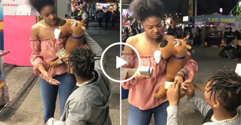 Girlfriends Starts Laughing when Boyfriend Proposes At Carnival