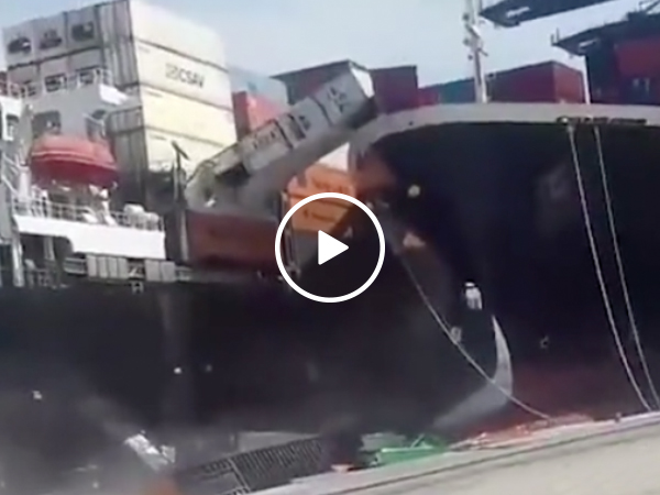 Two container ships collide in the port of Karachi destroying tons of cargo