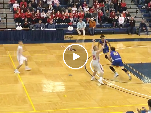 High School Basketball Player Makes A Full Court Shot To Win A Game