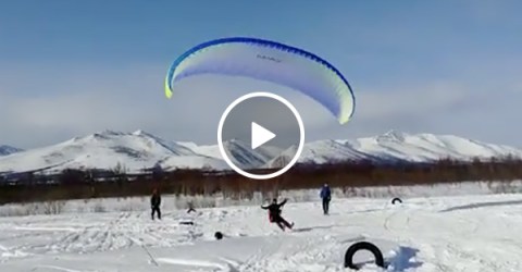 Parasailing Off a Snowmobile Goes Horribly Wrong