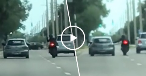 Driver Crashes into Taunting Motorcycle During Road Rage (Video)