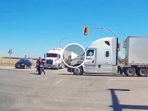 Motorcyclist Lucky To Be Alive After Being Hit By Semi Truck