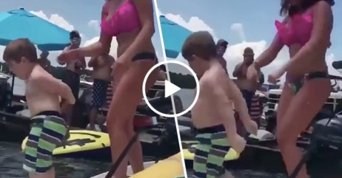 Little boy steals the show dancing at boat party (Video)