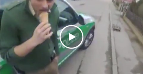 German cop pulls over motorcycle while eating ice cream (Video)