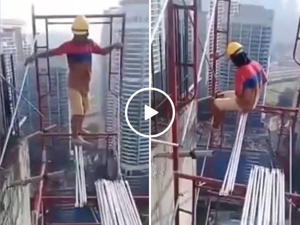 Construction worker building sky scraper without safety gear
