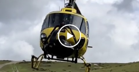 Helicopter Stuntman Films Right Under A Moving Aircraft