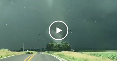 Tornado Rips A Shed Through the Air and Blows Through a Town