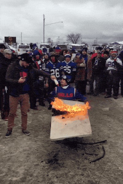 Bills fan body-slams another fan through a table because Bills fans have no  fear