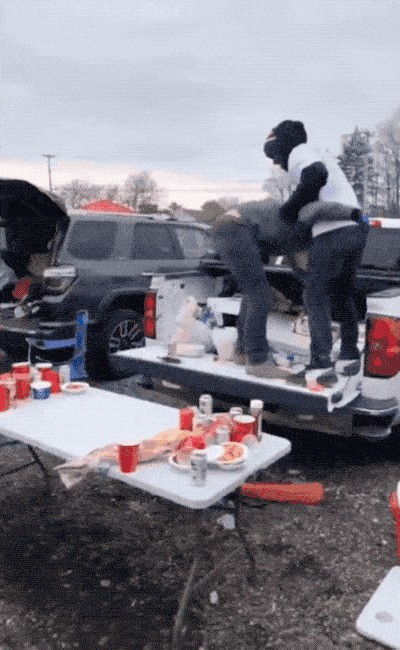 Bills Mafia Fans Destroying Table At Night GIF