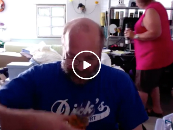 Man reviews scotch while his wife is leaving him in the background (Video)