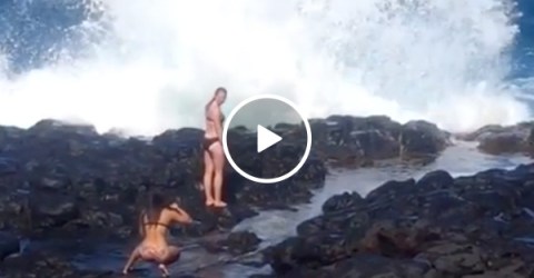 Girls taking Instagram photos vs. Poseidon himself (Video)