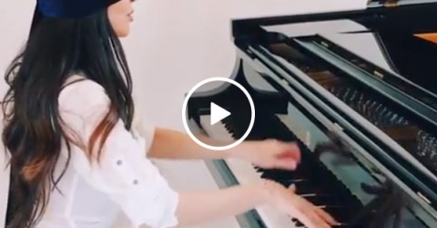Cute piano player pulls off "La Campanella" blindfolded, turns my D-Flat into a D-Major (Video)