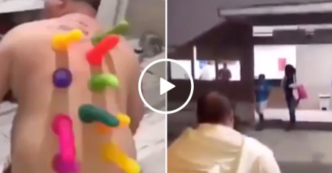 Warning: Glueing 10 dildos to your friend's back MIGHT end up in an ER trip (Video)