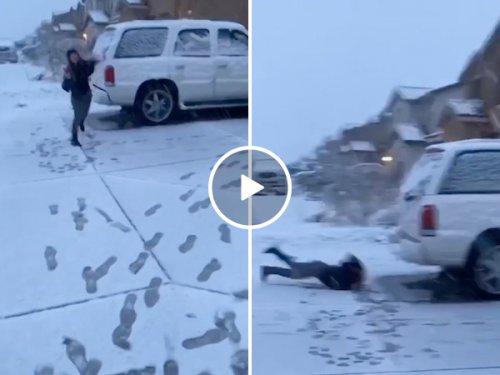 Sister takes a very painful face-plant after losing a snowball fight (Video)