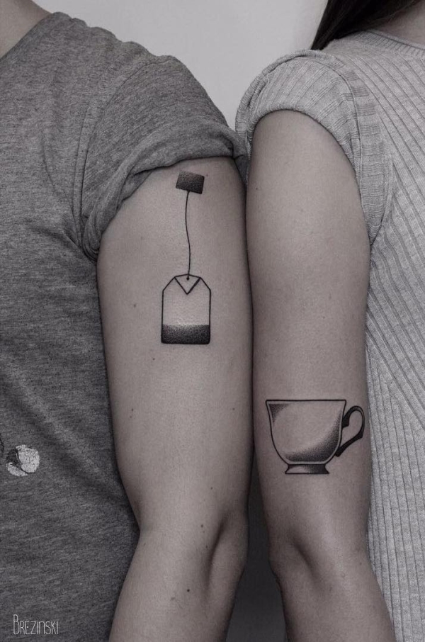 Tinder couple get matching tattoos before first date