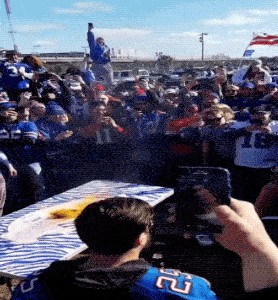 Bills Mafia Fan Smashing Table Caught On Fire GIF