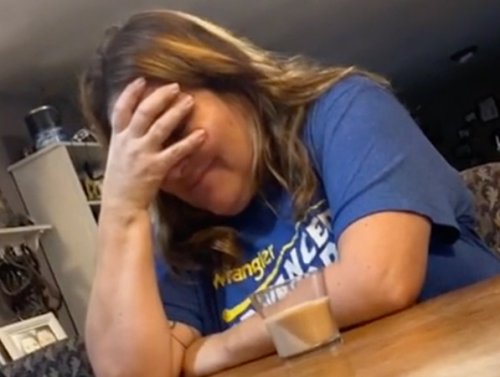 Oblivious mom has drink swapped with a candle (Video)