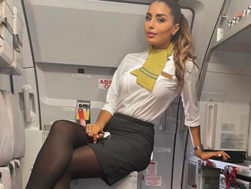 Sexy flight attendants making the skies *extra* friendly (33 photos)